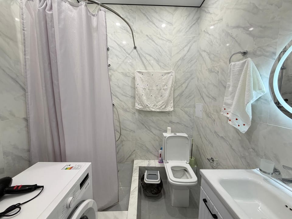 Уютная однушка в центре города Apartment in Almaty