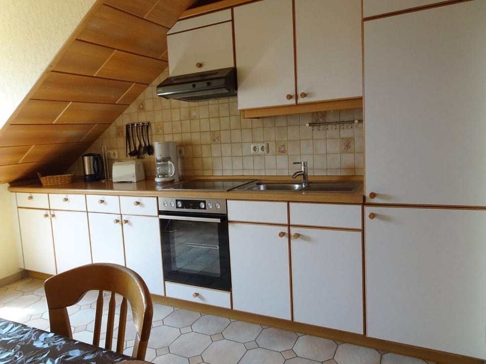 Kitchen or kitchenette, stove