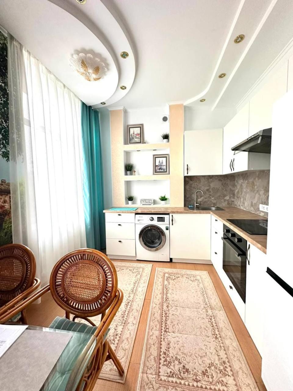 Kitchen or kitchenette, Dining area, oven, stove, washing machine