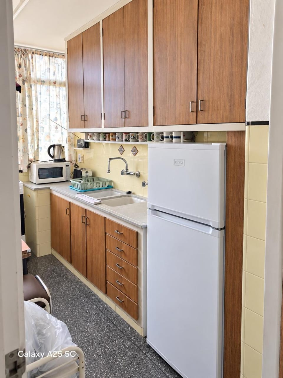 Kitchen or kitchenette, oven, stove