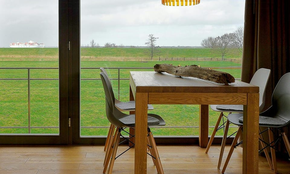 Elbe cottage with ship views near Stade House in Lower Saxony, Germany