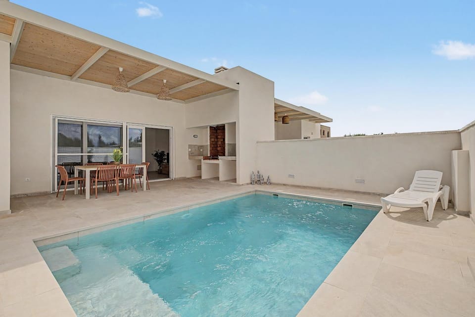 Property building, Living room, Swimming pool