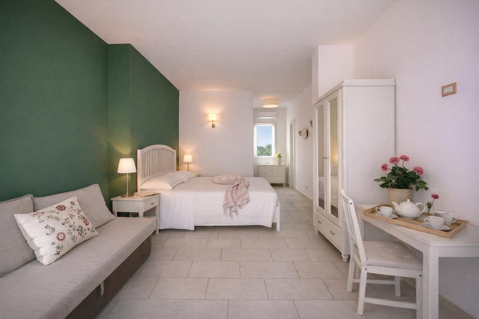 Bed, Living room, Photo of the whole room, Seating area, Bedroom, towels, wardrobe