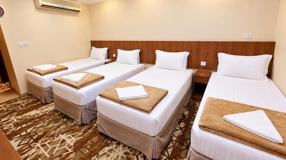 Bed, Photo of the whole room, Bedroom, towels, air conditioner