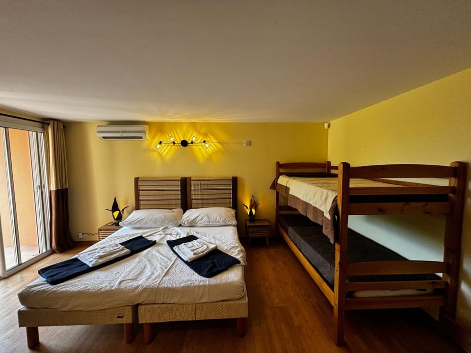 Bed, Photo of the whole room, Bedroom, bunk bed, towels, air conditioner