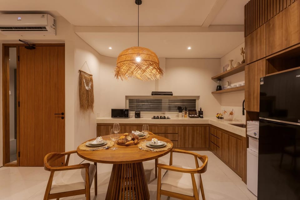 Property building, Night, Dining area, microwave, stove, kitchen, air conditioner