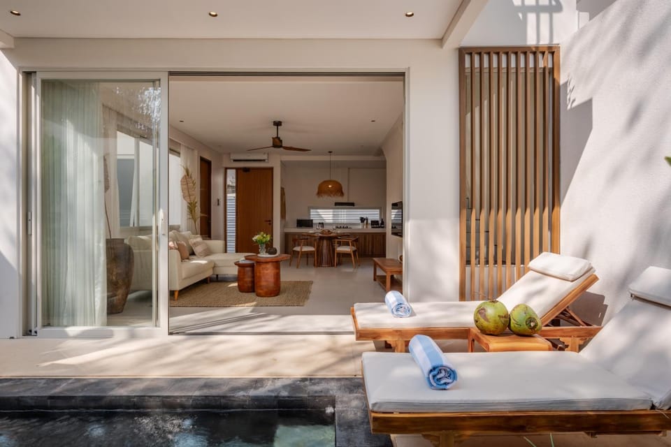 Property building, Day, Living room, Seating area, Pool view, Swimming pool, towels, kitchen, air conditioner
