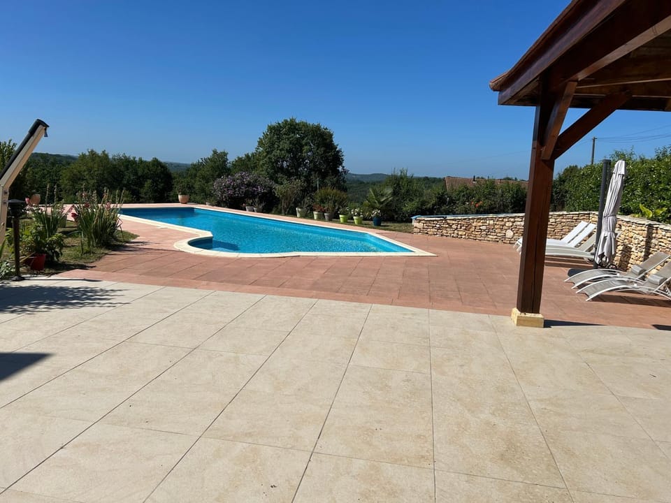 Property building, Living room, Swimming pool