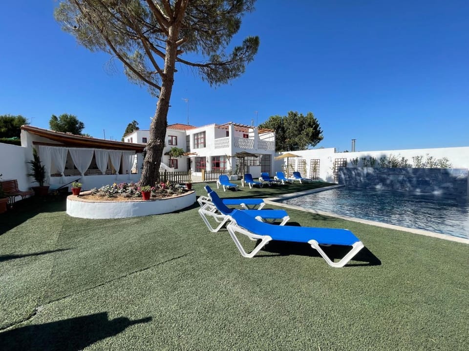 Property building, Living room, Swimming pool