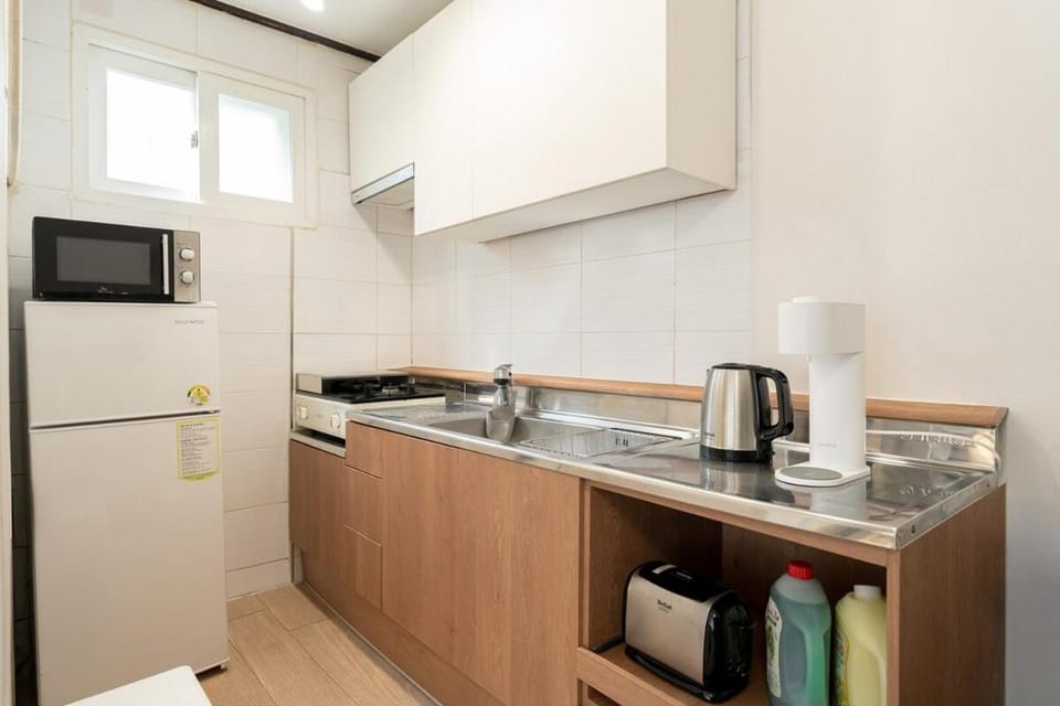 Kitchen or kitchenette, microwave, toaster