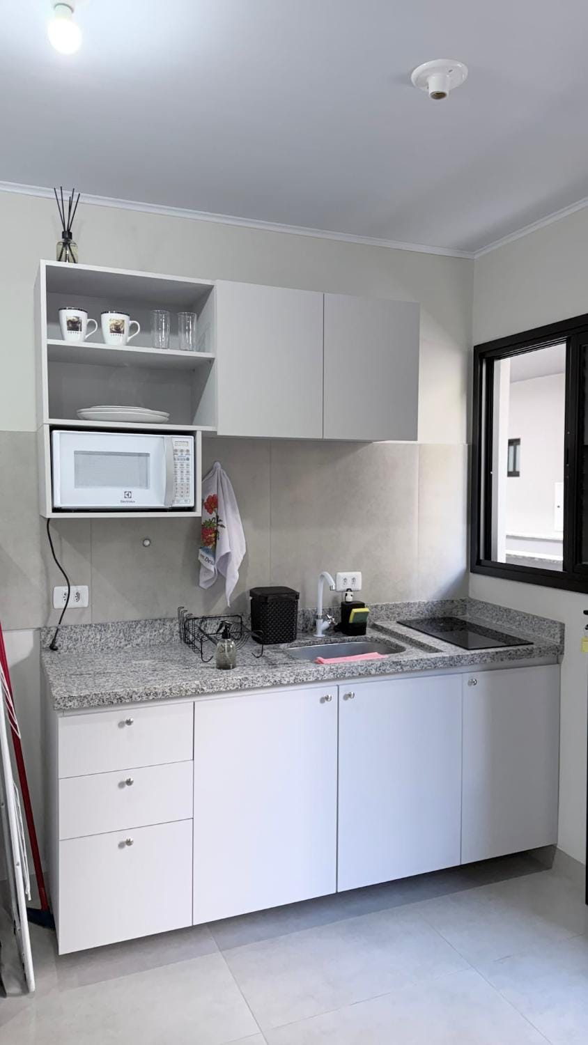 Kitchen or kitchenette, stove