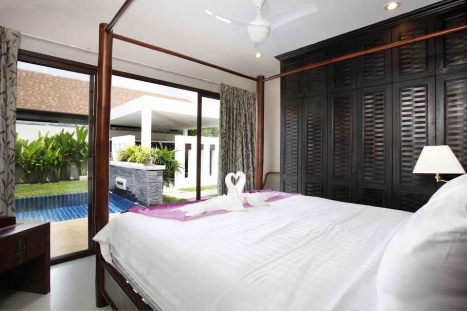 Bedroom, Pool view, towels, wardrobe, air conditioner