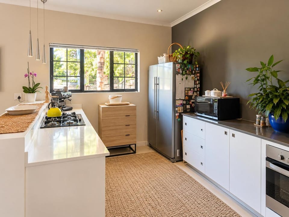 Kitchen or kitchenette, dishwasher, oven, stove, toaster