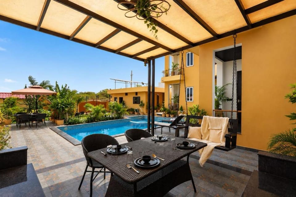 Property building, Day, View (from property/room), Living room, Seating area, Dining area, Pool view, Swimming pool, Swimming pool