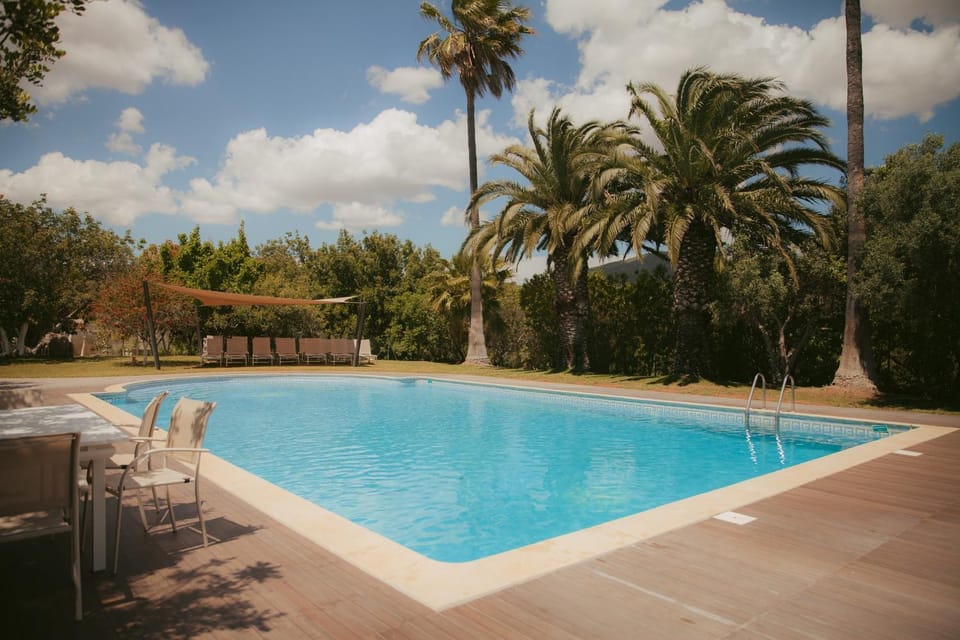 Property building, Living room, Swimming pool