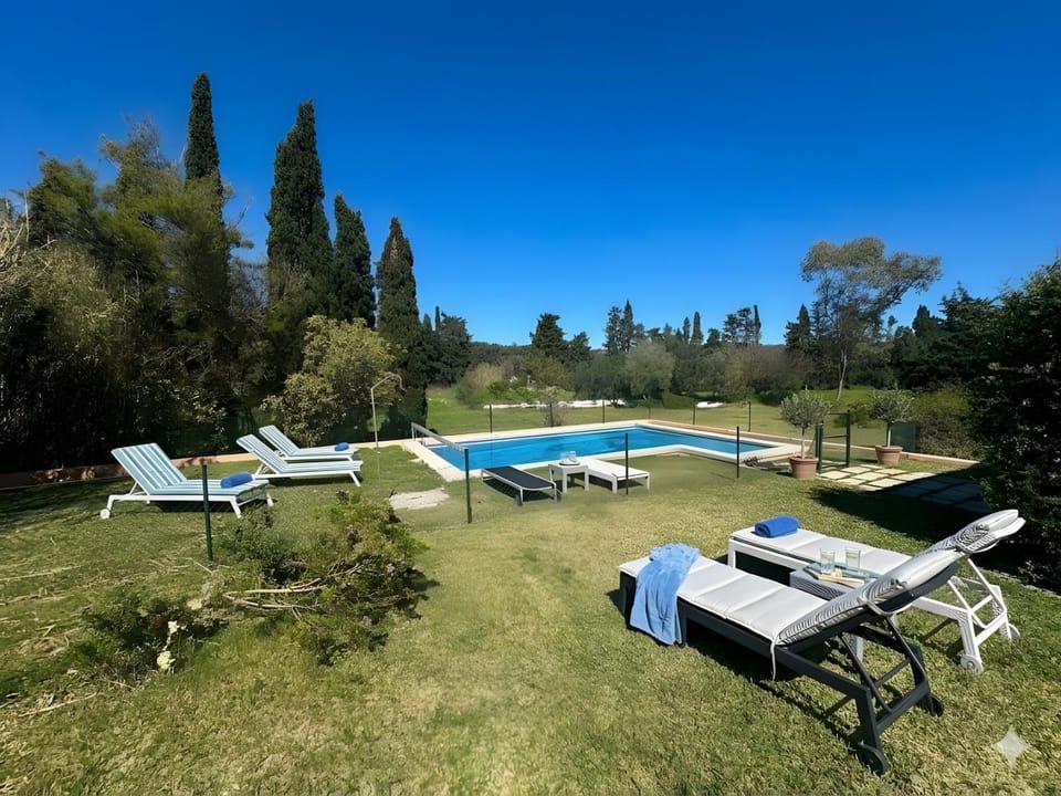 Property building, Living room, Swimming pool