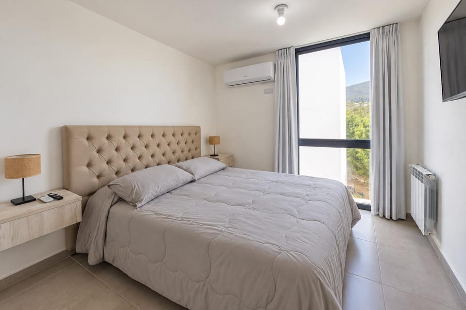 centrico depto con vistas a la sierras, pileta y cochera Apartment in Villa Carlos Paz