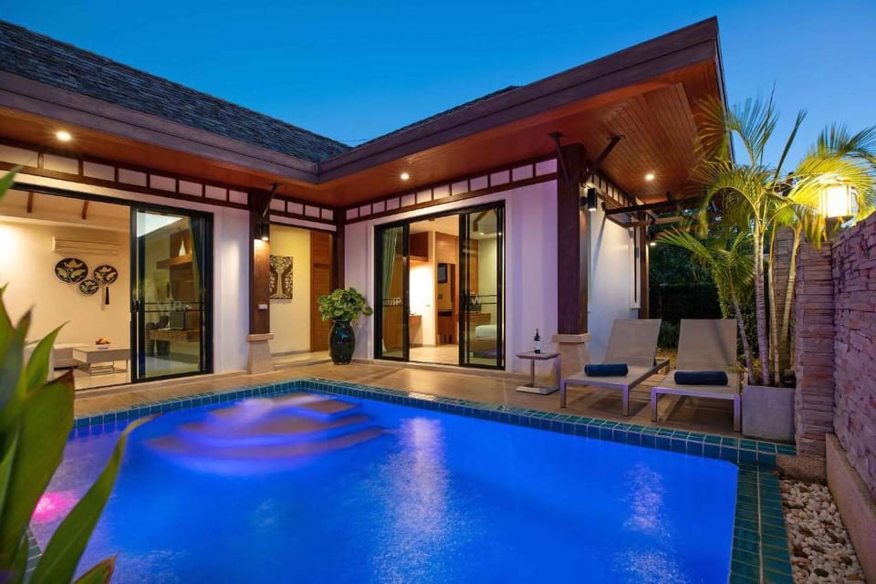 Property building, Patio, Night, Pool view, Swimming pool, Swimming pool, sunbed