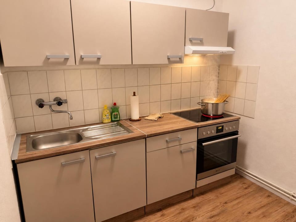 Kitchen or kitchenette, stove