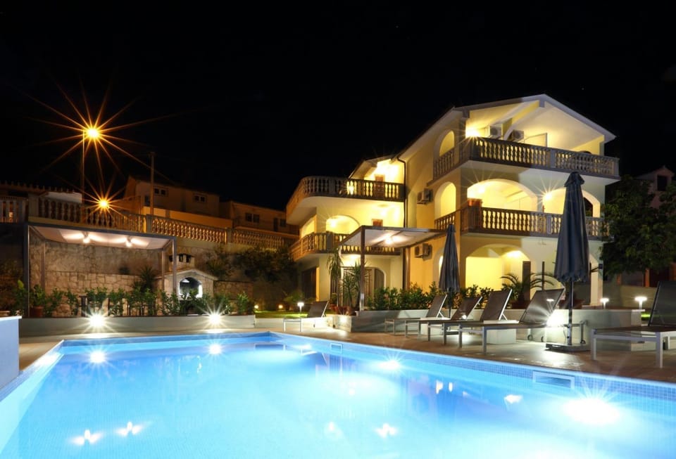 Property building, Night, Swimming pool, Swimming pool
