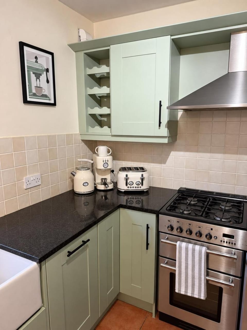 Kitchen or kitchenette, dishwasher, stove, toaster