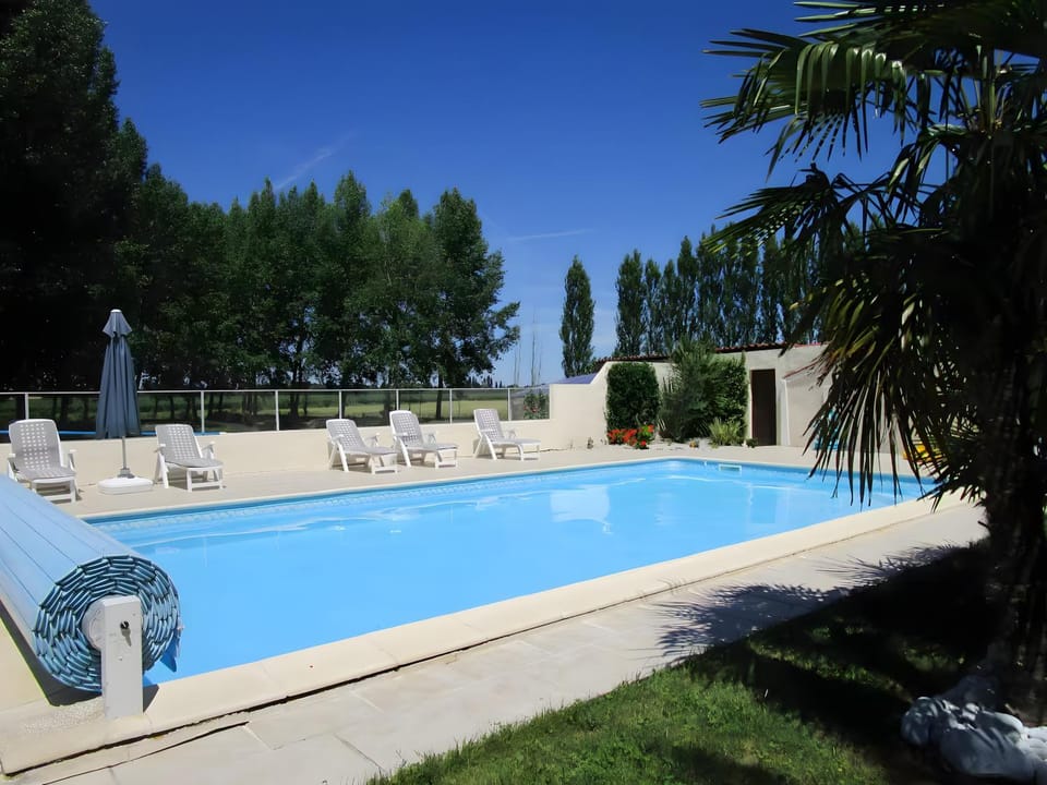 Property building, Living room, Swimming pool
