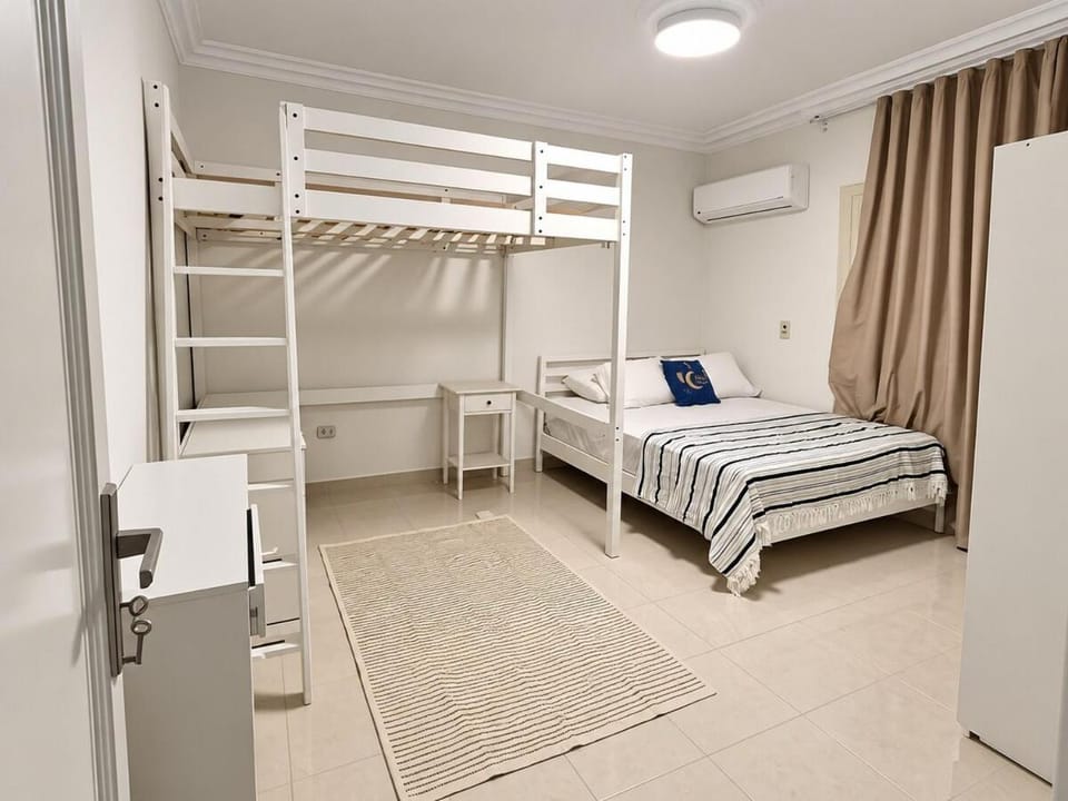 Bed, Photo of the whole room, bunk bed, wardrobe, air conditioner