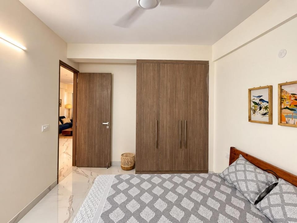 Stylish 3BHK Retreat with Balcony and PS5 Gurgaon Apartment in Gurugram
