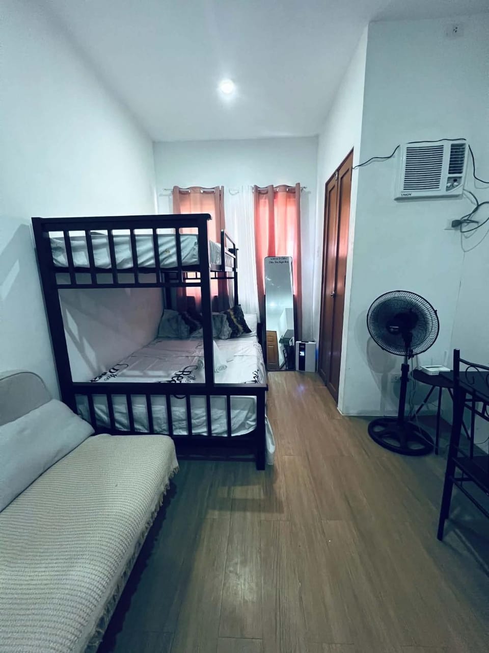 Bed, Living room, Seating area, Bedroom, bunk bed, air conditioner