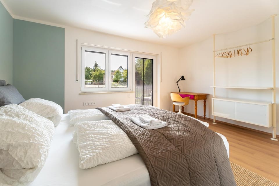 Bed, Seating area, Bedroom