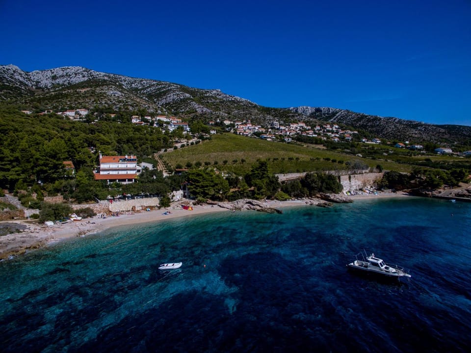 Natural landscape, Bird's eye view, Beach, Garden view, Landmark view, Mountain view, Pool view, Sea view