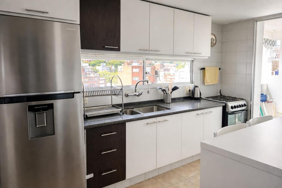Kitchen or kitchenette, microwave, oven, toaster