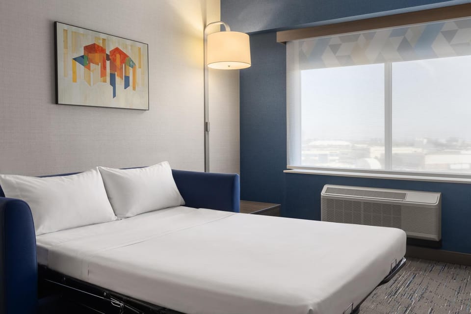 Bed, Living room, Seating area, Bedroom