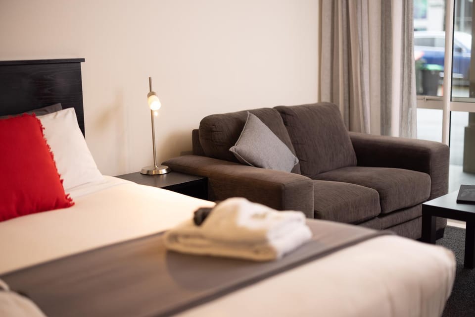 Bed, Living room, Seating area, Bedroom, towels