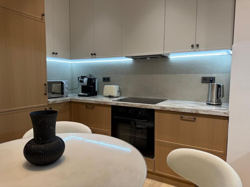EXPO King Bed 2 TVs Apartment in Kazakhstan