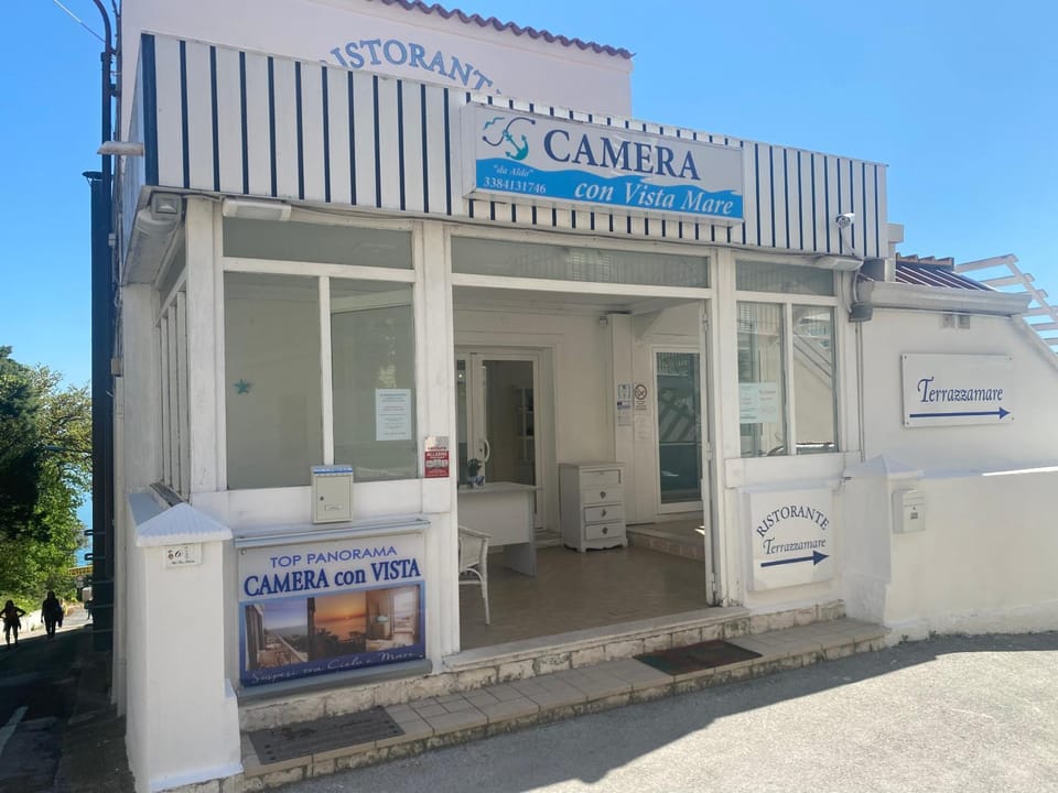 Day, Property logo or sign, Logo/Certificate/Sign, Street view, Certificate/Award