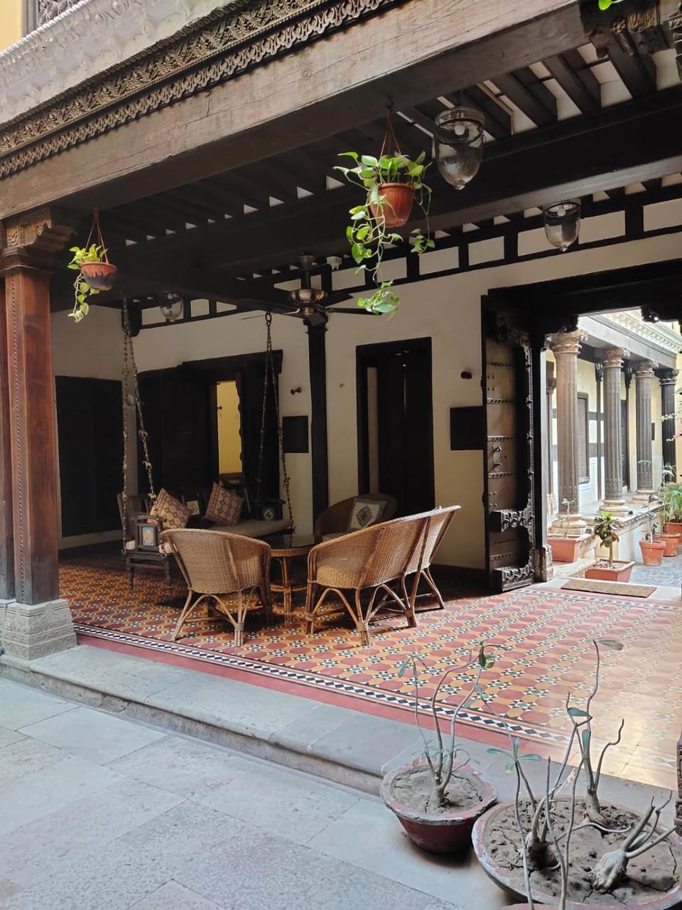 Property building, Patio, Living room, Seating area