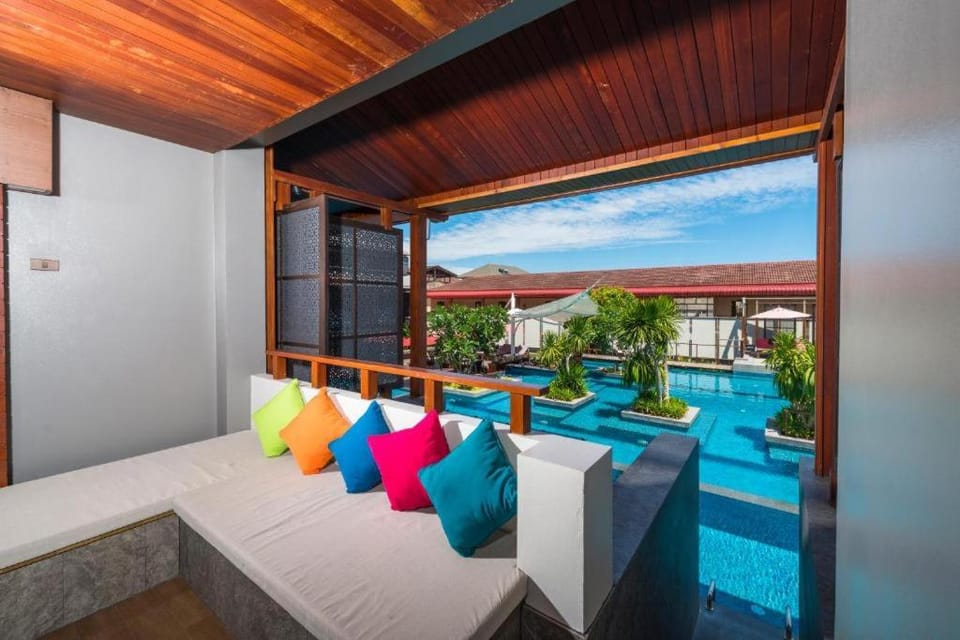 View (from property/room), Balcony/Terrace, Seating area, Swimming pool, sunbed