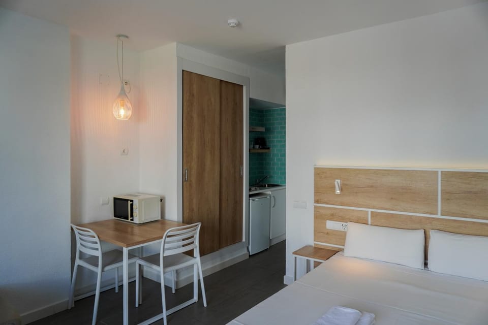 Bed, wardrobe, kitchen