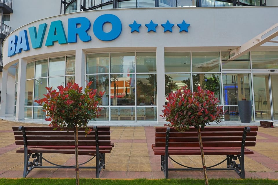 Property building, Day, Property logo or sign, Seating area