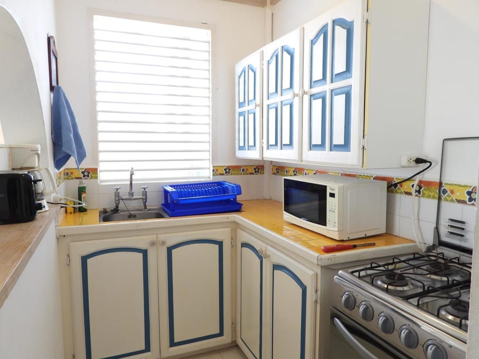 Kitchen or kitchenette, oven, stove, toaster, kitchen