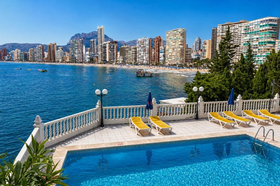 Property building, Nearby landmark, Day, Natural landscape, Beach, City view, Pool view, Sea view, Swimming pool, sunbed
