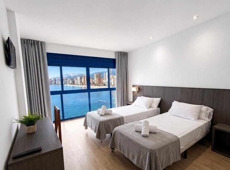 Bed, Photo of the whole room, Bedroom, Landmark view, Pool view, Sea view, towels