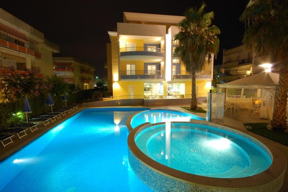 Property building, Night, Swimming pool