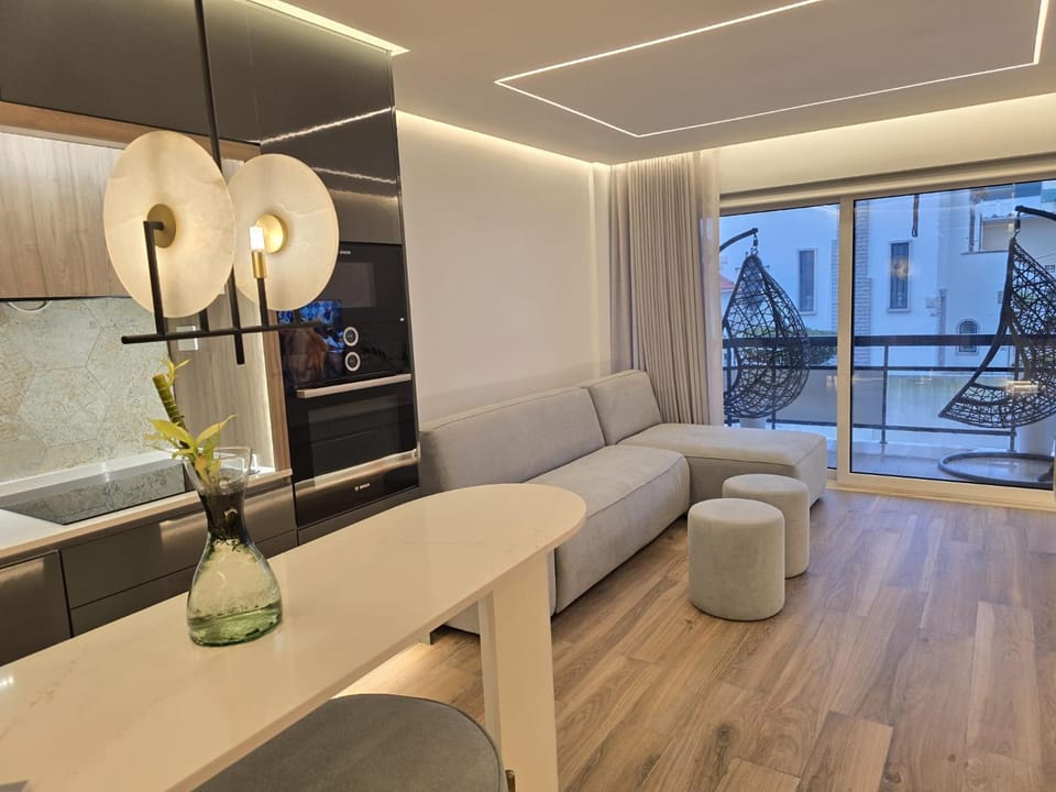 TV and multimedia, Kitchen or kitchenette, Living room, Seating area, Dining area, dishwasher, microwave, oven, stove, washing machine, dryer