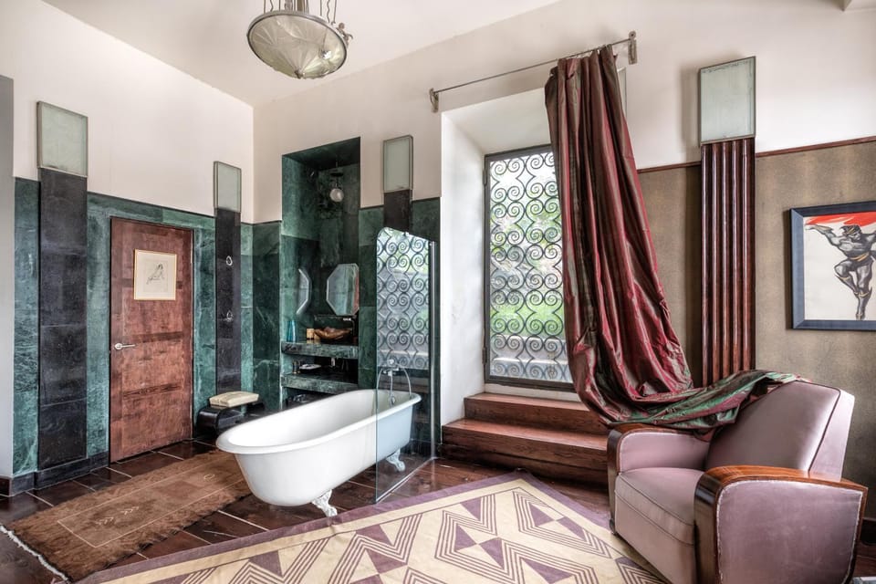 Shower, Toilet, Property building, Property logo or sign, Hot Tub, Bathroom, Decorative detail, Decorative detail, Family