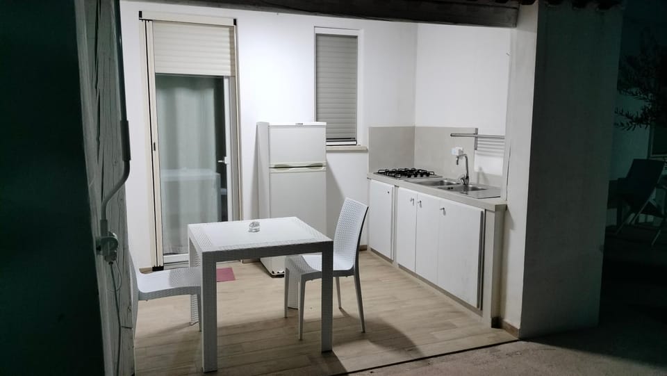 Kitchen or kitchenette, stove