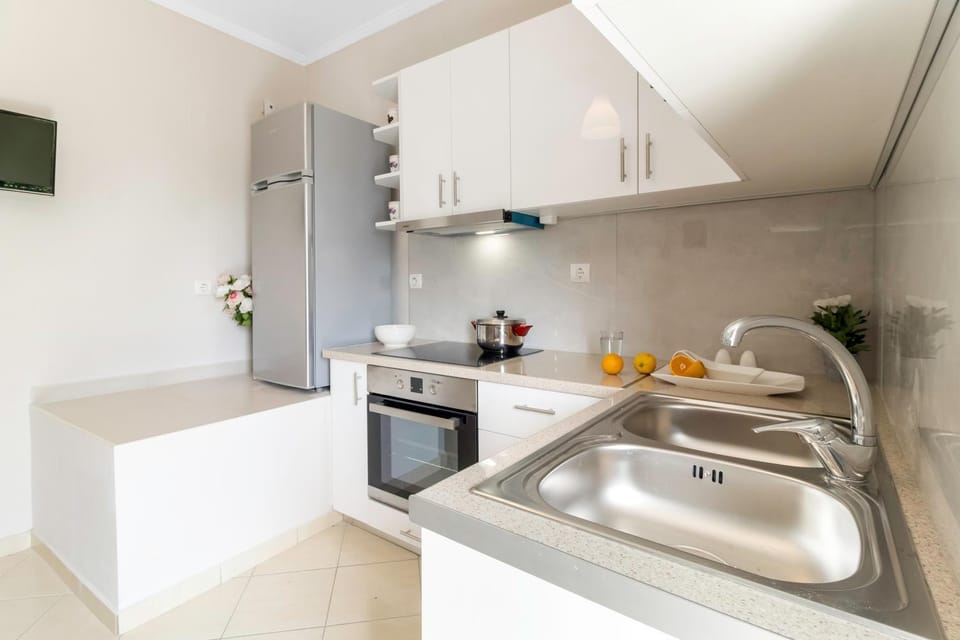 Kitchen or kitchenette, stove