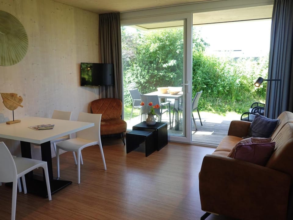 View (from property/room), Balcony/Terrace, Living room, Seating area, Garden view