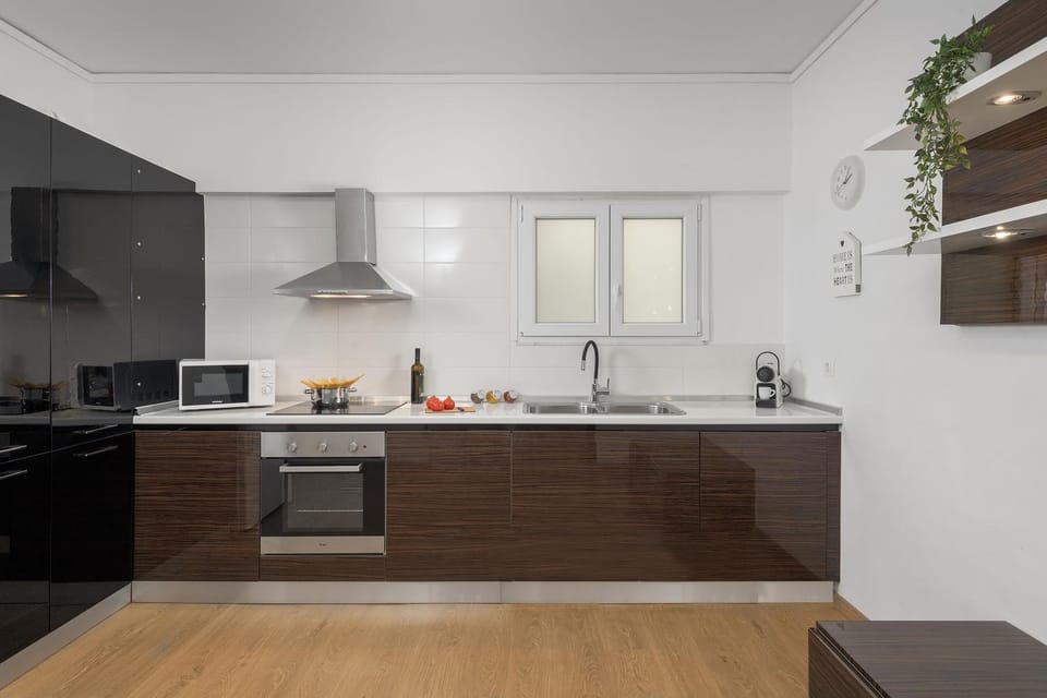 Kitchen or kitchenette, dishwasher, microwave, oven, stove, toaster, kitchen
